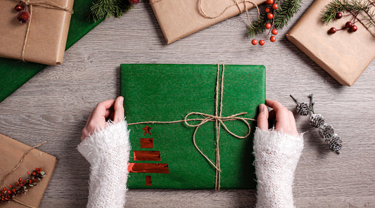 Woman opening Christmas present
