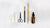 Bathroom items in line on bathroom counter