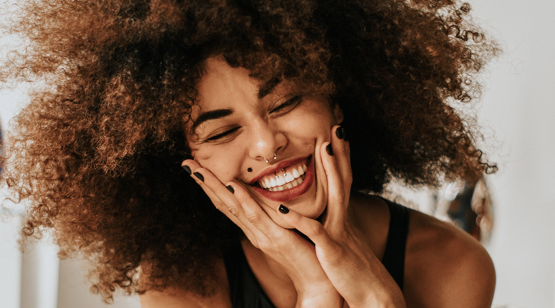 Woman laughing and smiling