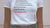 Woman wearing shirt with empowering messages