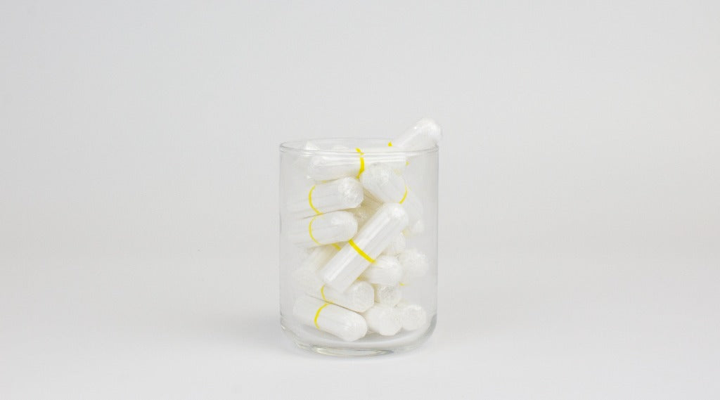 What makes tampons white?